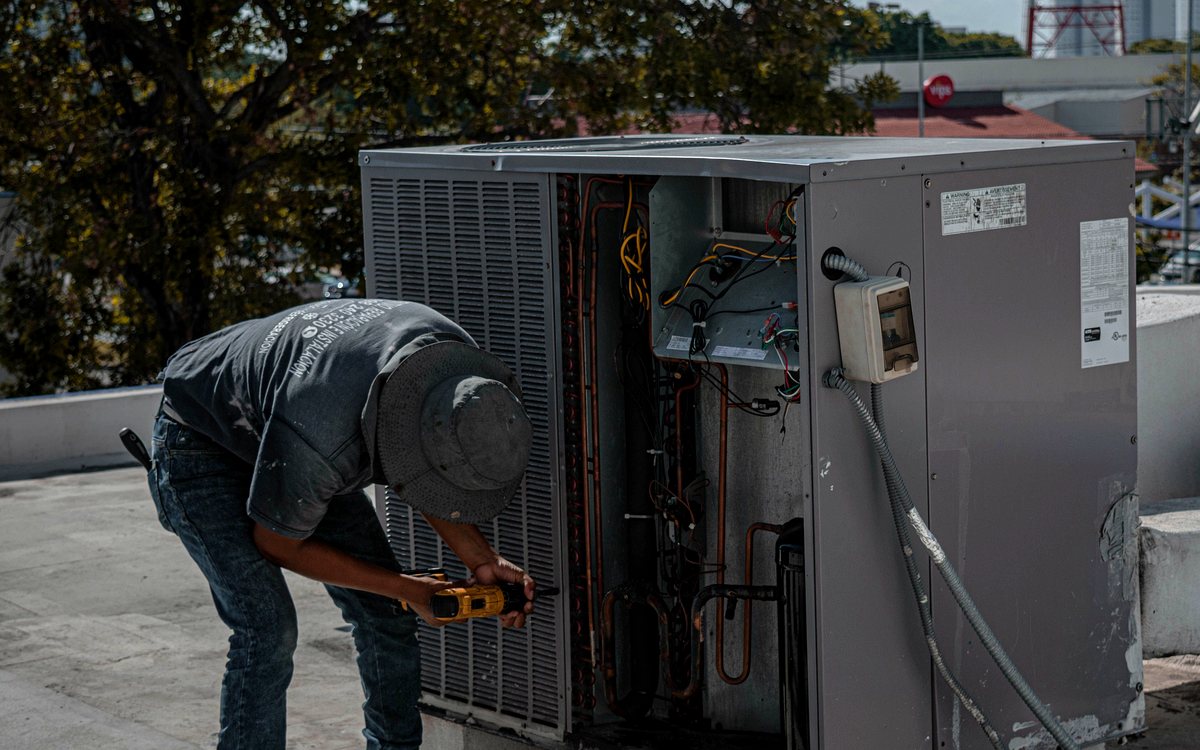 Outdoor AC unit repair and electrical inspection